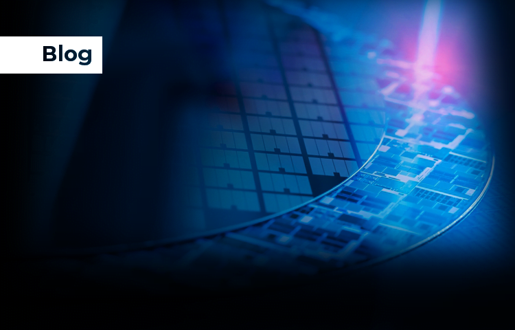 Close-up view of semiconductor wafers with intricate circuitry patterns. The image features a blue and pink lighting effect, highlighting the details on the chip.